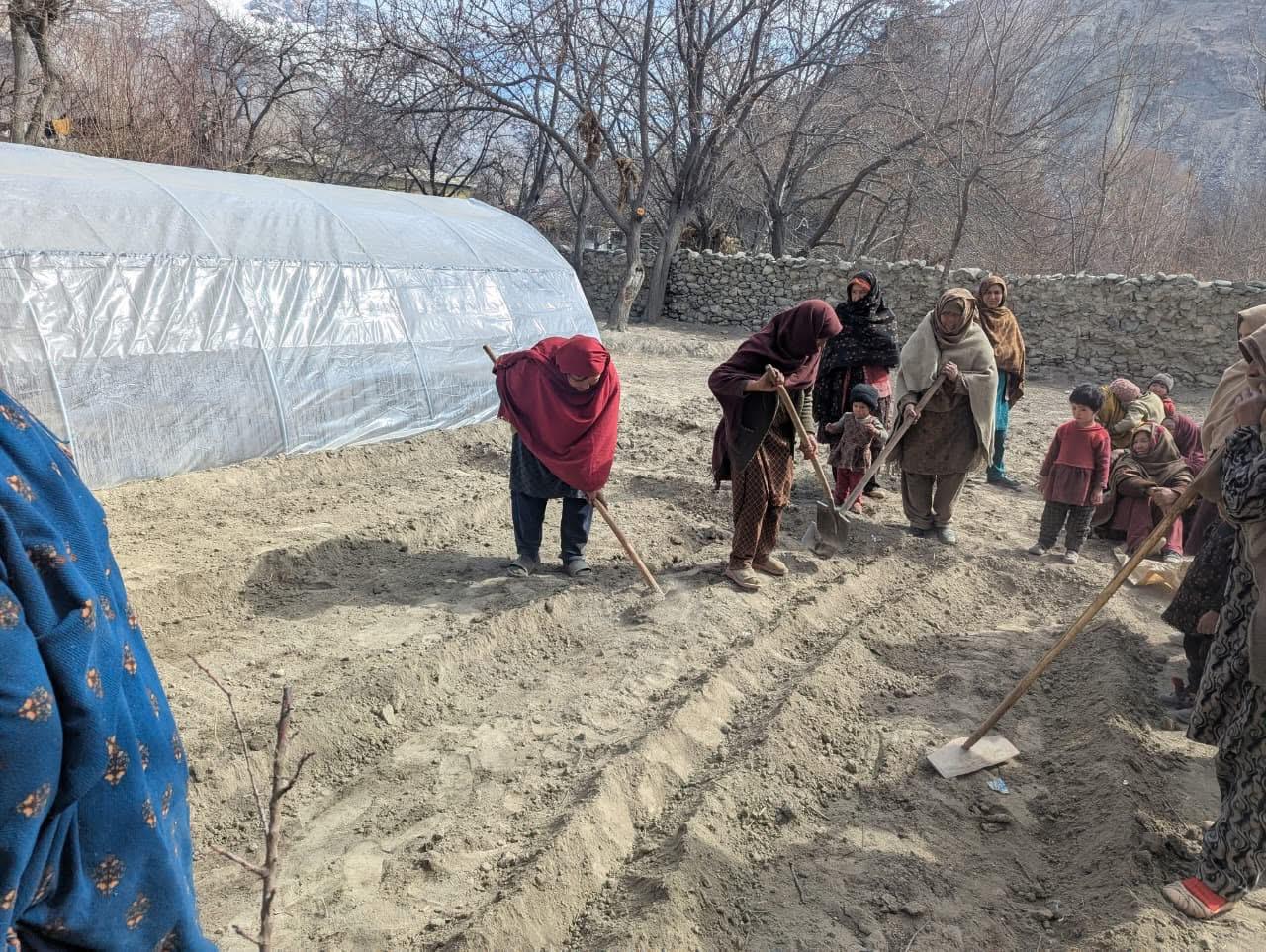 Women farmers preparing land for greenhouse cultivation - Gilgit-Baltistan
